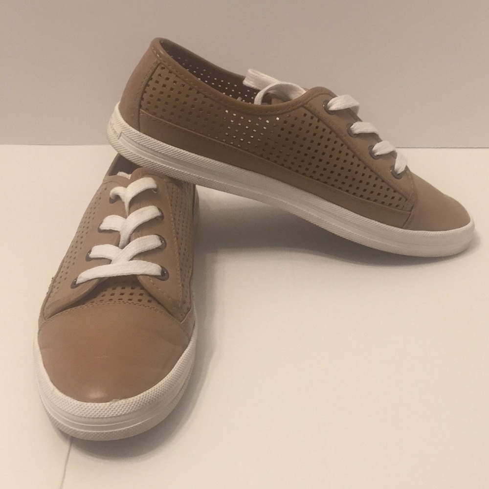 Calvin Klein tan, leather sneakers.